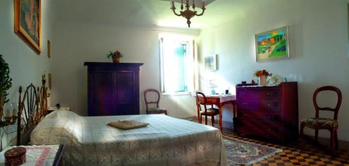 Postel nebo postele na pokoji v ubytování B&B IL CASTELLO
