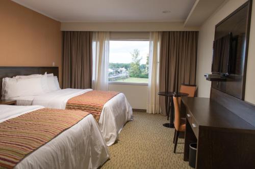 Postel nebo postele na pokoji v ubytování Mayim Hotel Termal & Spa