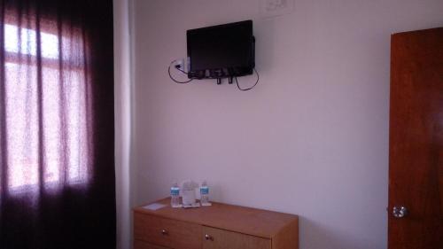 TV a/nebo společenská místnost v ubytování Hotel Patria