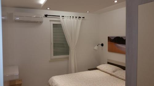 Katil atau katil-katil dalam bilik di Apartment Luna