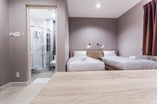 Katil atau katil-katil dalam bilik di Morino Hotel Si Racha