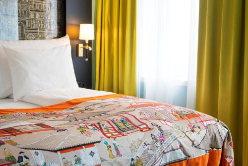 Ένα ή περισσότερα κρεβάτια σε δωμάτιο στο Thon Hotel Stavanger