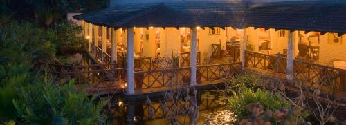 an aerial view of a restaurant at night at Pinewood Beach Resort and Spa in Diani Beach