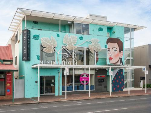a building with a mural of a woman on it at Majestic Minima Hotel in Adelaide