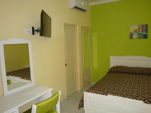 Кровать или кровати в номере Hotel Santander SD