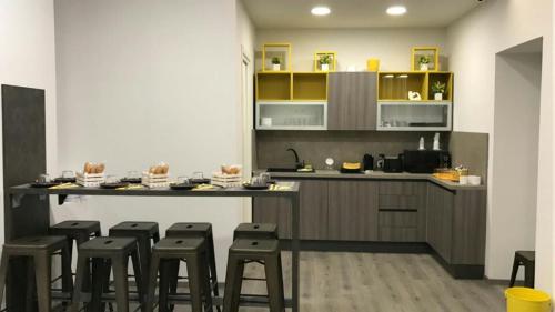 A kitchen or kitchenette at Sensation House