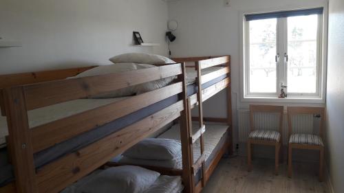 Postel nebo postele na pokoji v ubytování STF Möja Vandrarhem