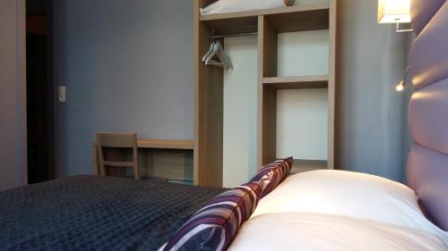 Katil atau katil-katil dalam bilik di Hotel Napoléon