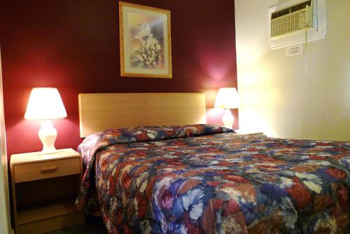 Postel nebo postele na pokoji v ubytování Boundary Motel