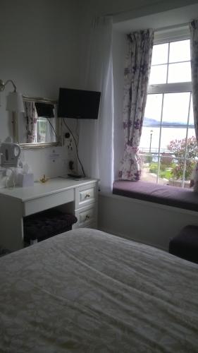 Llit o llits en una habitació de Culag Lochside Self Catering