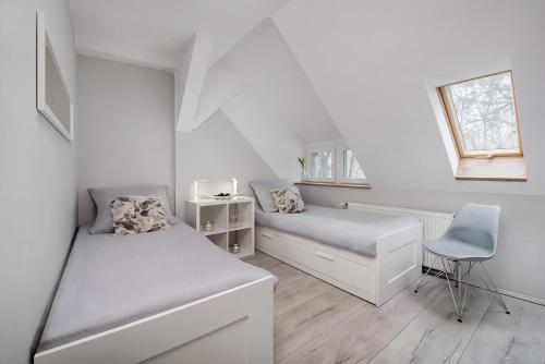 Postel nebo postele na pokoji v ubytování Fitness Hostel - restauracja, darmowy parking i siłownia