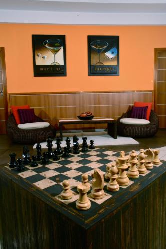 a chess board on a table in a room at Hotel Futura Centro Congressi in Naples