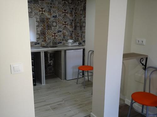 Una cocina o zona de cocina en Hostal Castilla