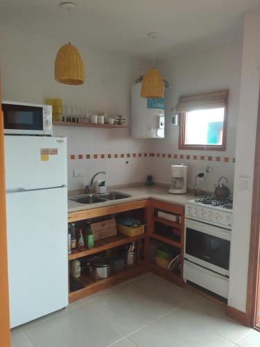Dapur atau dapur kecil di Cabañas Casazul
