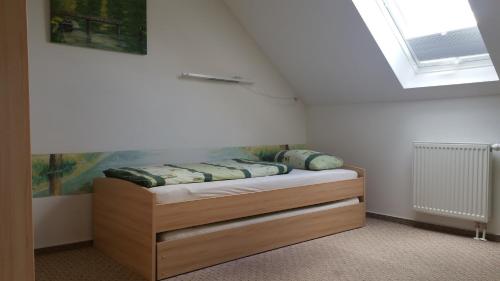 Ένα ή περισσότερα κρεβάτια σε δωμάτιο στο Ferienwohnung "Fährmannsruh "