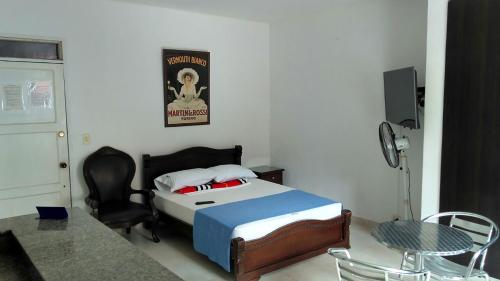 Cama o camas de una habitación en Arco Apartasuites