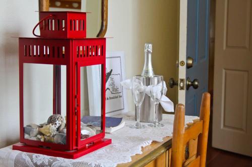 a table with a red lantern on top of it at Lost Whale Inn in Trinidad
