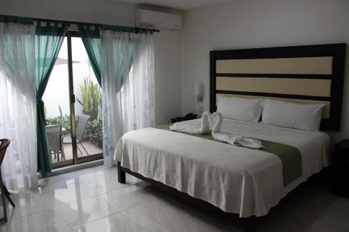 Photo de la galerie de l'établissement Hotel Malecón, à Campeche
