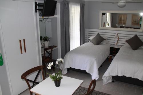 Katil atau katil-katil dalam bilik di Paperbark Bed & Breakfast