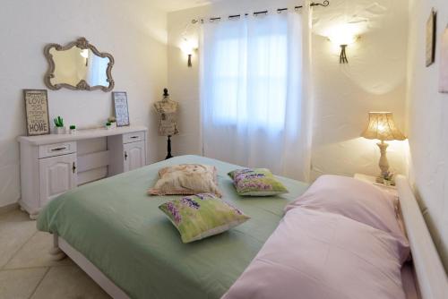 Postel nebo postele na pokoji v ubytování Villa Rajski Dvori