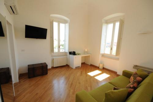 TV a/nebo společenská místnost v ubytování Maremaris B&B