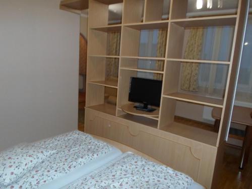Кровать или кровати в номере Piroshka Hotel