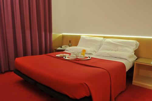 Hotel Arianeにあるベッド