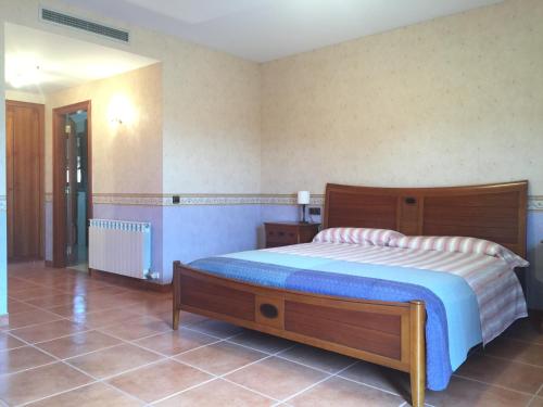 Postel nebo postele na pokoji v ubytování Villa Merce