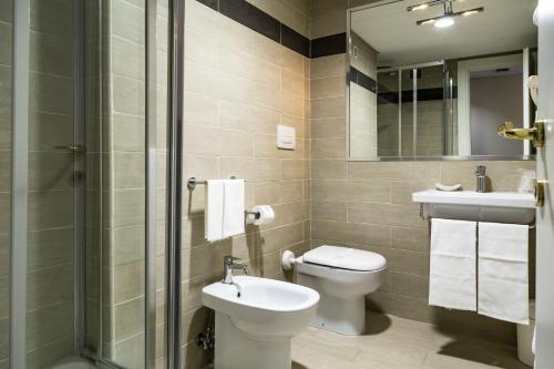 Koupelna v ubytování Hotel Pineta Palace