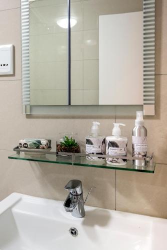 Ένα μπάνιο στο Savannah Park Luxury Apartments