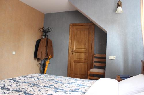 Ένα ή περισσότερα κρεβάτια σε δωμάτιο στο Hotel Barin House