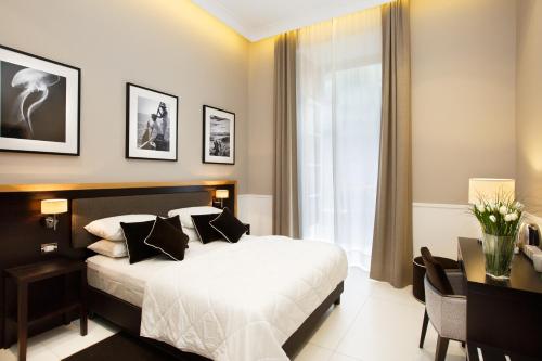 Katil atau katil-katil dalam bilik di NAP Luxury Guest House Bovio