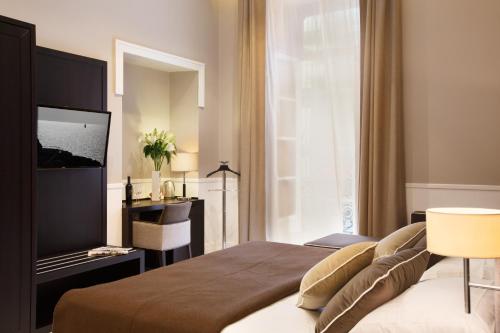 Katil atau katil-katil dalam bilik di NAP Luxury Guest House Bovio
