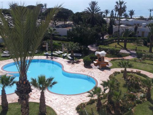 Bazén v ubytování CALIMERA Delfino Beach Resort & Spa nebo v jeho okolí