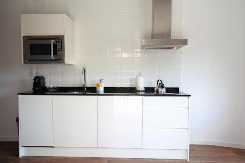 Dapur atau dapur kecil di Fuente Torán Apartamentos