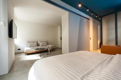 Uma cama ou camas num quarto em Syntagma Square Modern Apartments
