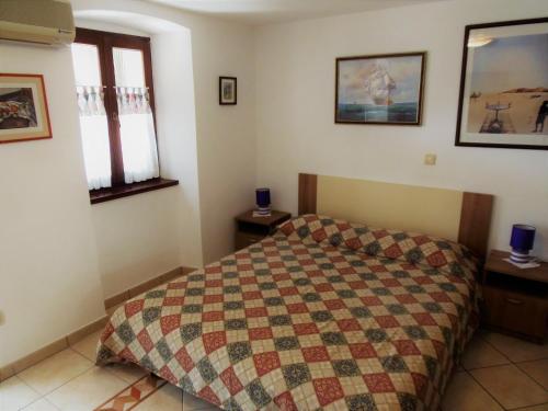 Ένα ή περισσότερα κρεβάτια σε δωμάτιο στο Apartment Noemi