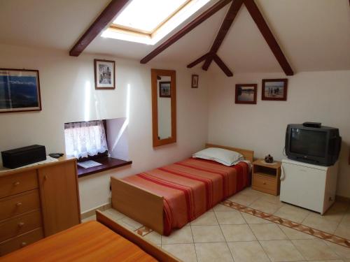 Μια τηλεόραση ή/και κέντρο ψυχαγωγίας στο Apartment Noemi