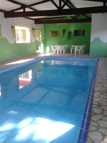 Kolam renang di atau dekat dengan Pousada Recanto Águas Vivas