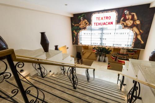 a room with a staircase with a sign on the wall at Royal Solaris Los Cabos - All Inclusive in San José del Cabo