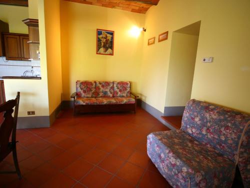 Posezení v ubytování Spacious Farmhouse in Pienza with Swimming Pool