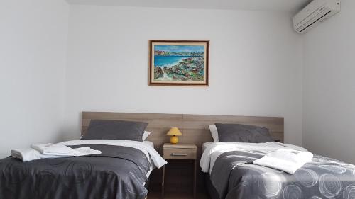 Ένα ή περισσότερα κρεβάτια σε δωμάτιο στο Villa Kristina
