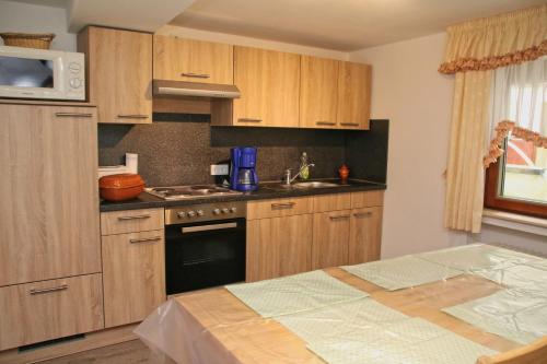 ครัวหรือมุมครัวของ Ferienhaus am Doctorberg