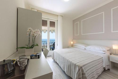 Postel nebo postele na pokoji v ubytování Hotel Plaza Esplanade
