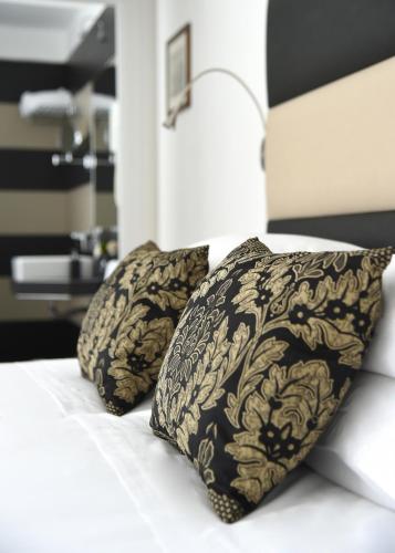 Katil atau katil-katil dalam bilik di Bella Sorrento B&B