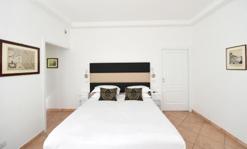 Katil atau katil-katil dalam bilik di Bella Sorrento B&B