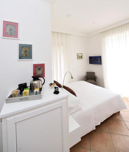 Katil atau katil-katil dalam bilik di Bella Sorrento B&B