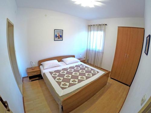 Кровать или кровати в номере Apartments Borovina