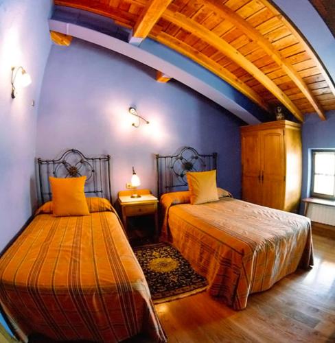 Katil atau katil-katil dalam bilik di Agroturismo Iberreko Errota