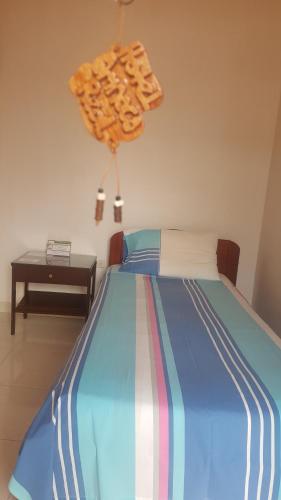 Postel nebo postele na pokoji v ubytování Hotel Orinoco Real